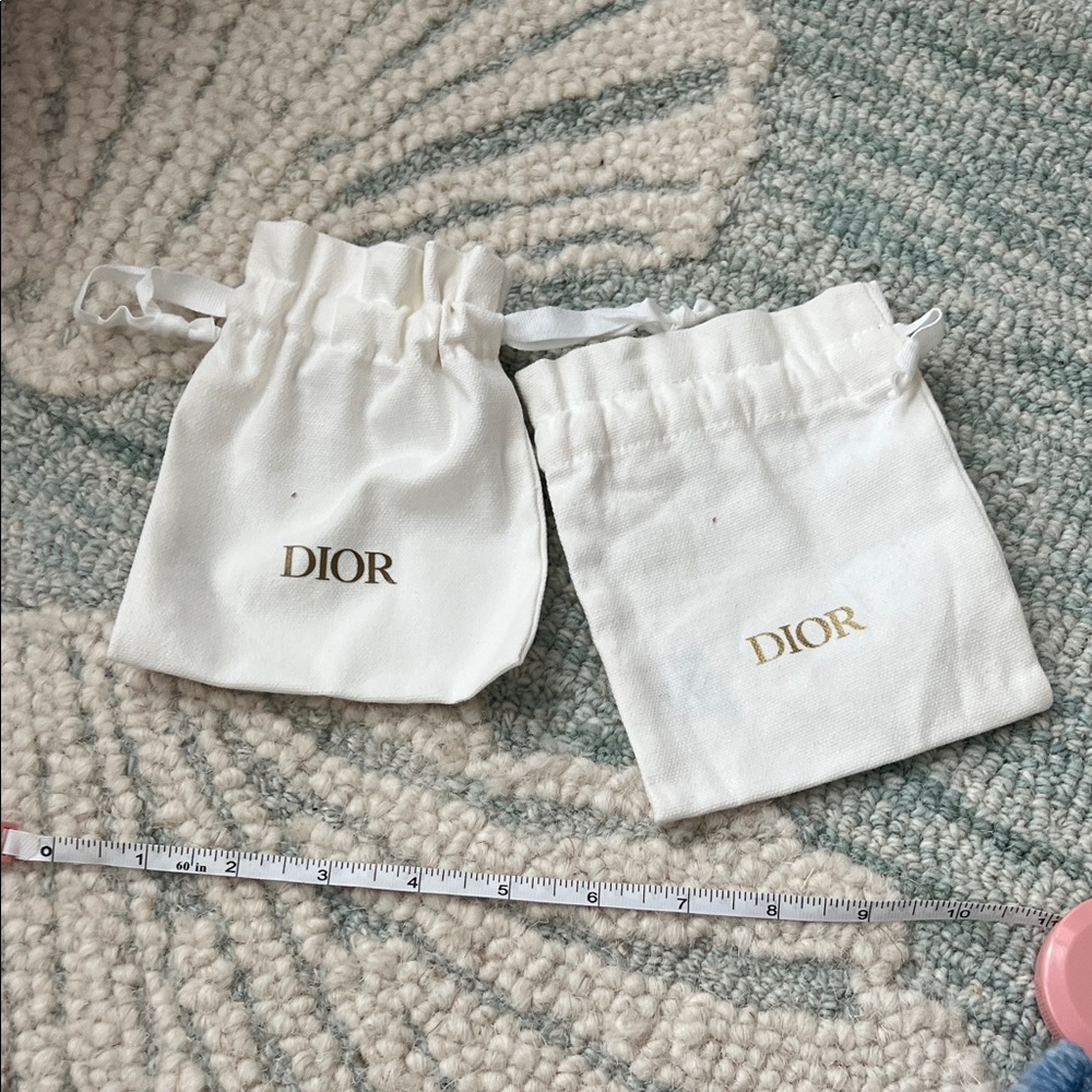 Dior Cream Drawstring Bags